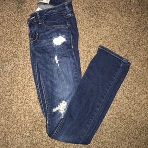 Distressed Dark Skinny Jeans
